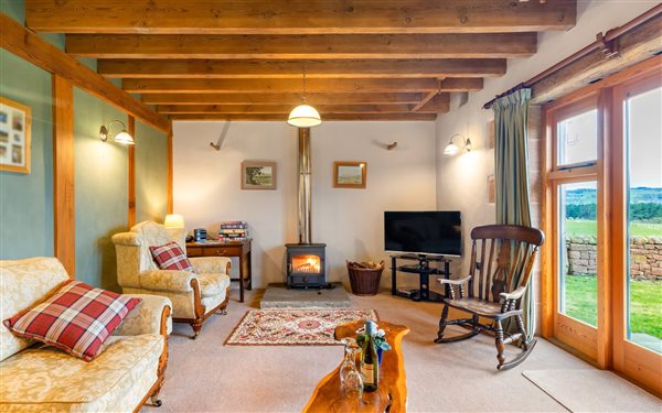 Comfy lounge with Peak District views, cosy log fire and smart TV