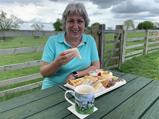 Catherine enjoying afternoon tea from Local pub VE DAY