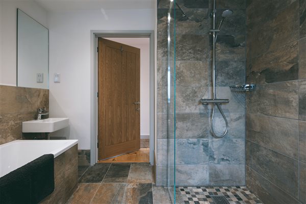 Tiled wet room rain shower bath accessible