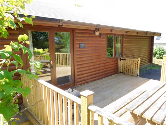 spacious enclosed decked area for bbq's