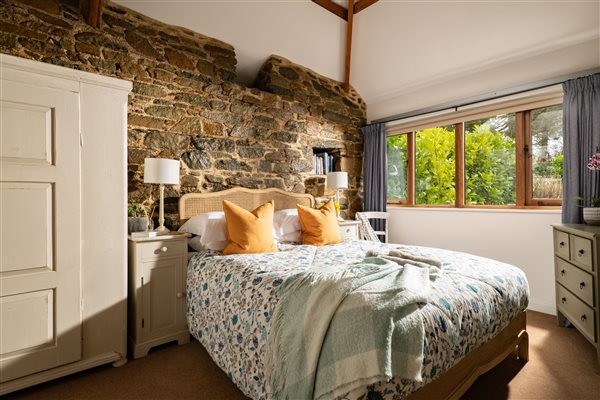 Bedroom in a luxury farm barn