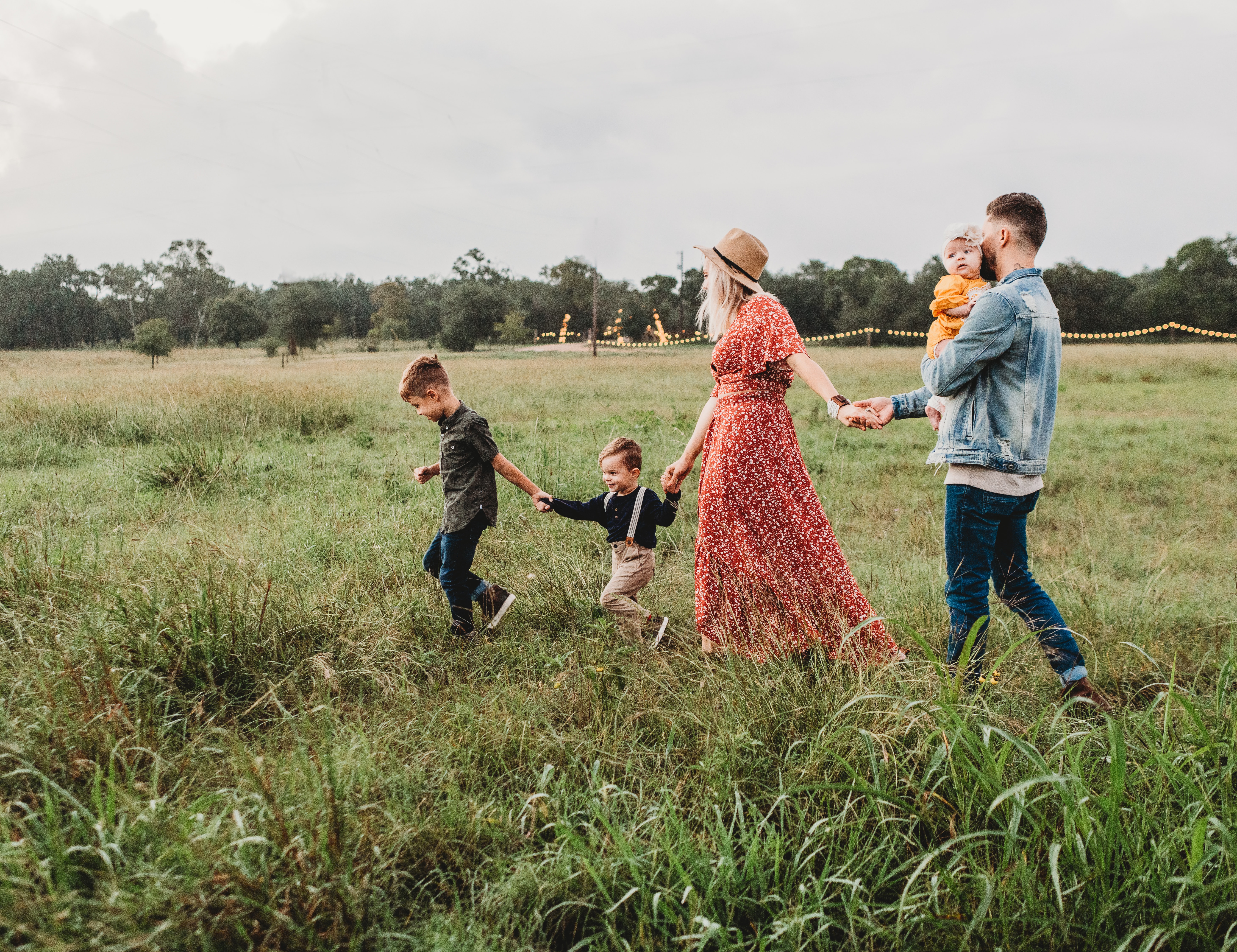 A family walking through a field