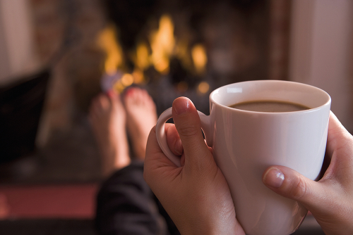 Hot drinks in front of the fire