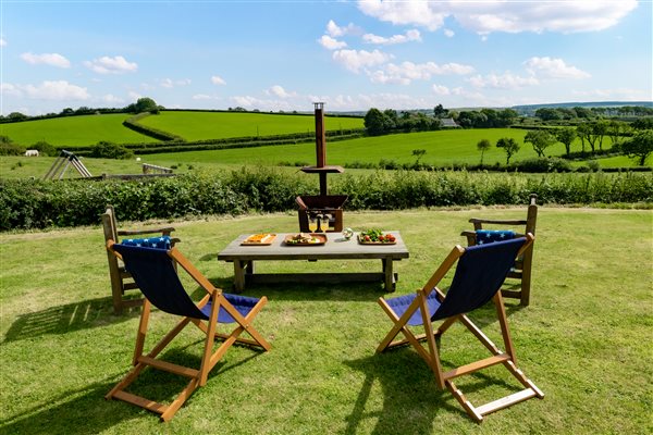 fire pit and deck chairs