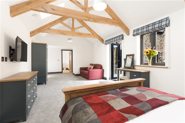 King bed with wardrobe, drawers and sofa