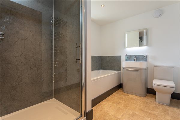 ensuite shower, seperate bath WC and sink