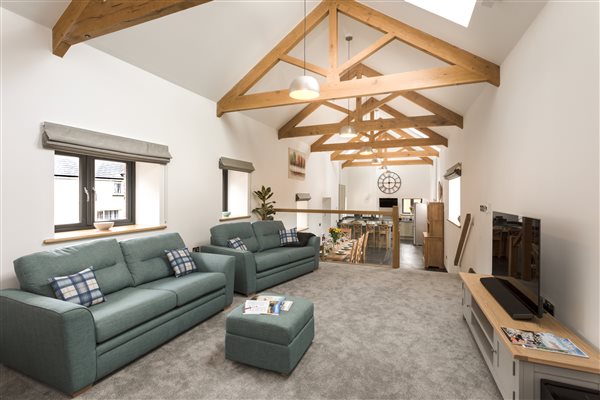 Lounge area overlooking dining and kitchen area