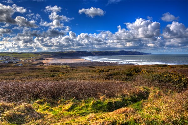 View of Widemouth Bay, North Cornwall from the South West Coast path. The beach and sea are the in the background