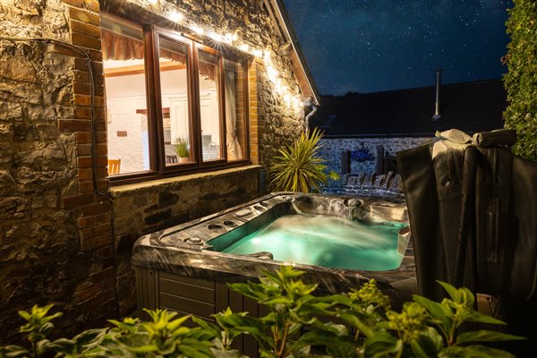 Ivy hot tub at night