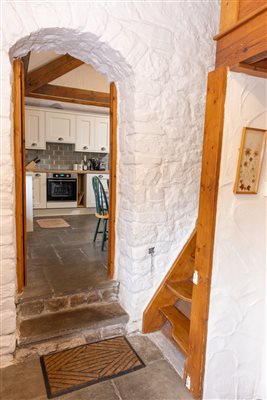 hallway into the kitchen/living space