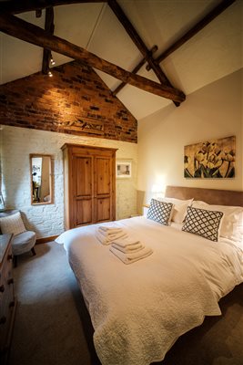 king bedroom with oak beams