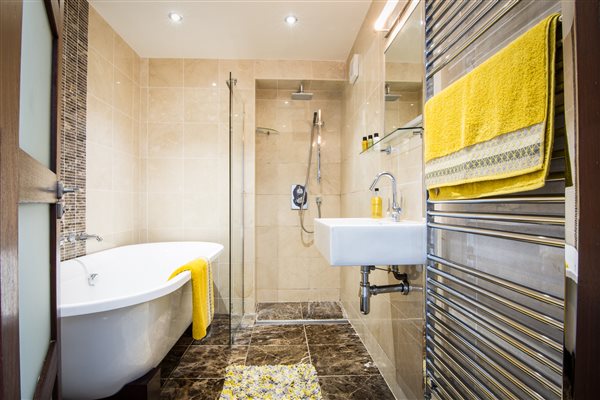 Bathroom with Rain shower and Freestanding Bath