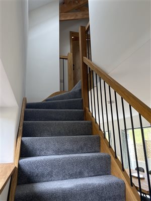 Stairs up to first floor