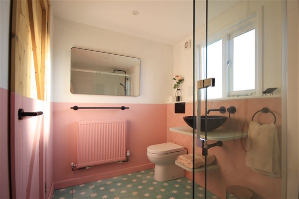 pink bathroom luxury holiday home lakeside cabin
