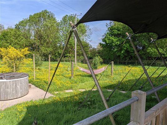 safari tent and hot tub