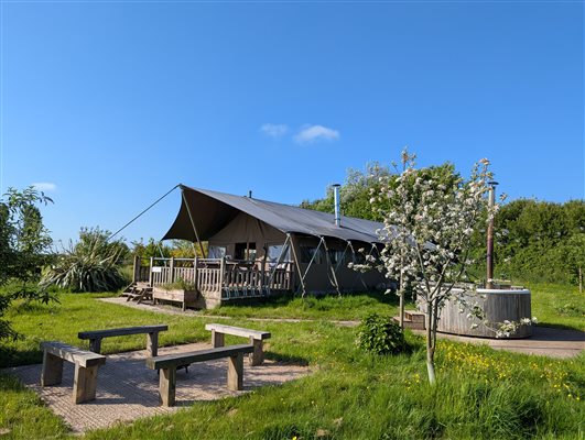 safari tent and hot tub