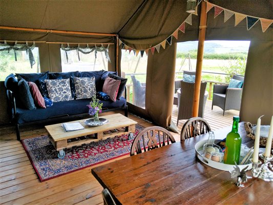 inside a safari tent at middle stone farm glamping