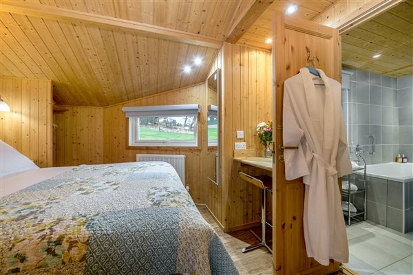 Bedroom in wooden lodge