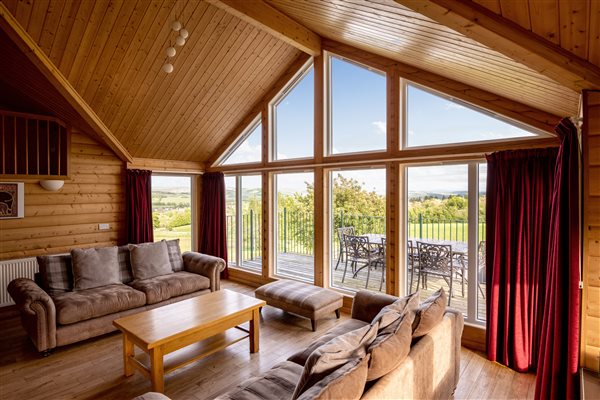 Wooden lodge and large windows