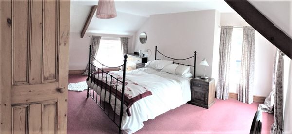 ensuite bedroom pine beams