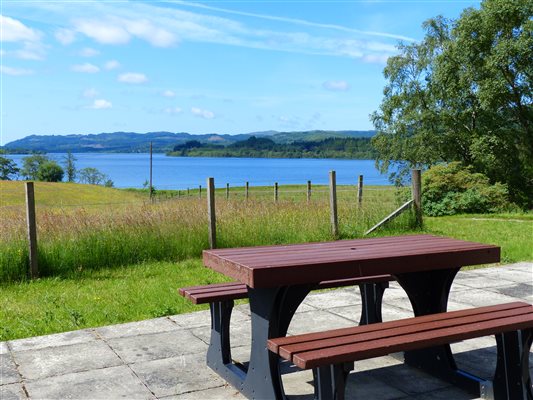 holiday cottage picnic table with view over Loch Awe 