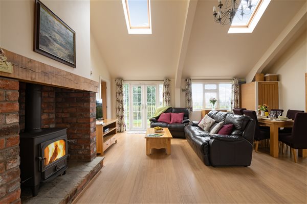 The Country Lodge - Comfortable Chairs in the Living Area