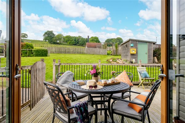view from decking of Rainster log cabin 