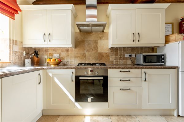 cream kitchen with oven