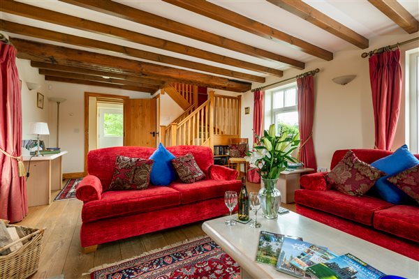 Light and airy living room with beams