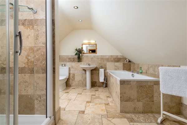 Large bathroom with separate shower and bath