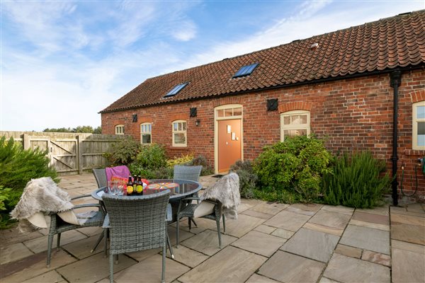 Courtyard garden with table and chairs