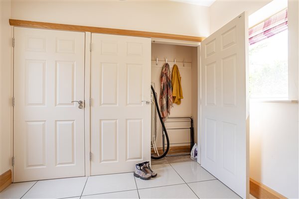 Handy porch area for walking boots and bicycles