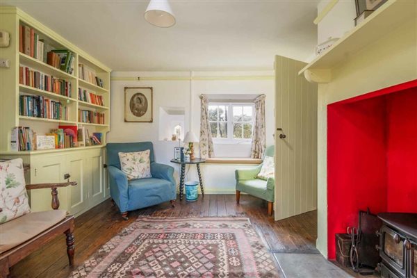 living room with woodburner