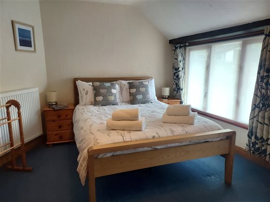 Linhay double bedroom. Plenty of room for a travel cot