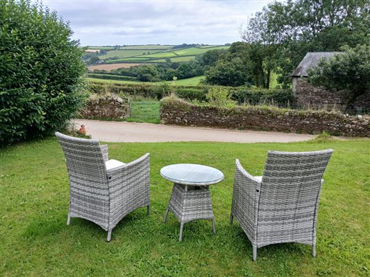 Enjoy a glass of wine looking over the farm