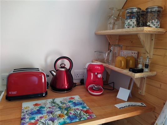 toaster, kettle, coffee machine, cups, shelving, condiments, glasses, accommodation, glamping, glamping pod, Essex, Maldon, UK