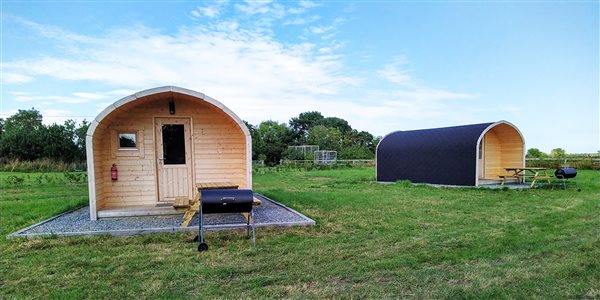 Front view of our 2 glamping pods