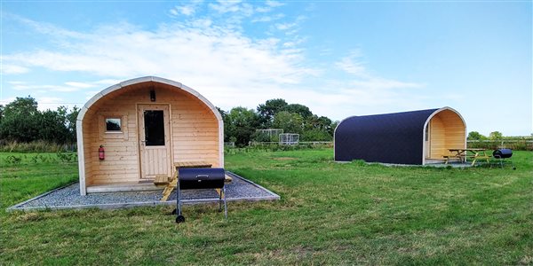 Front view of our 2 glamping pods Front view of our 2 glamping pods