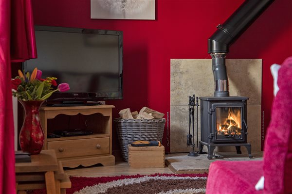 unwind in front of the wood burning stove