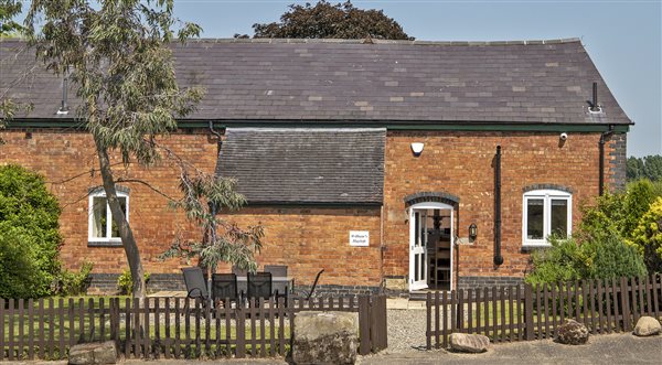 William's Hayloft has a large enclosed garden & patio