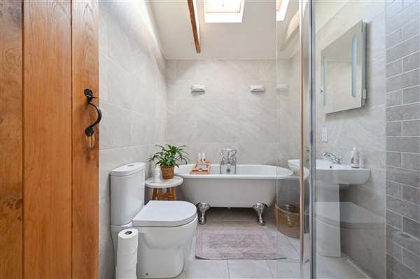 Bathroom with freestanding bath