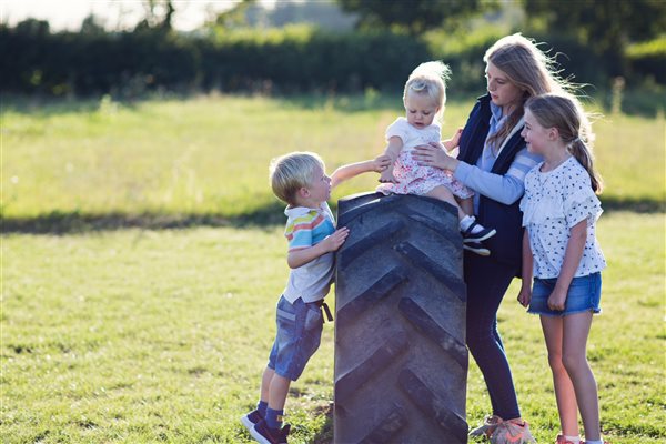 children playing on a farm