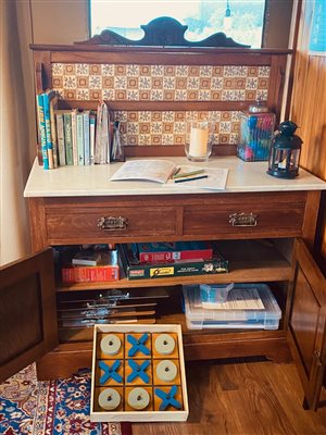 board games in cupboard