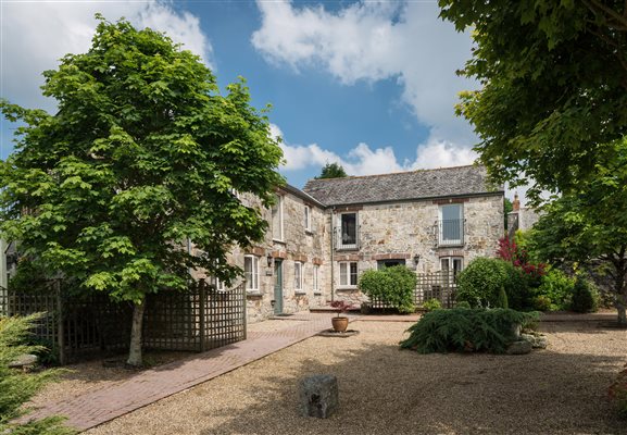 sympathetically renovated farm barns