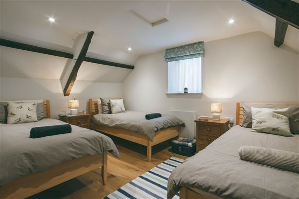 triple single bedroom with orthopaedic beds