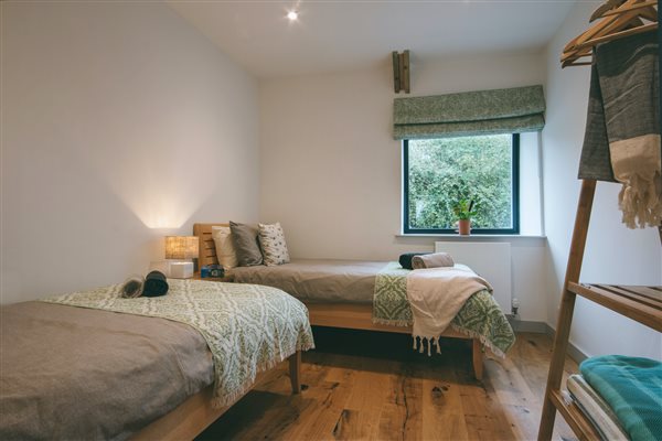 twin bedroom with orthopaedic demko organic natural beds accessible emf isolation switches