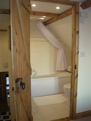 Bathroom with over bath Shower