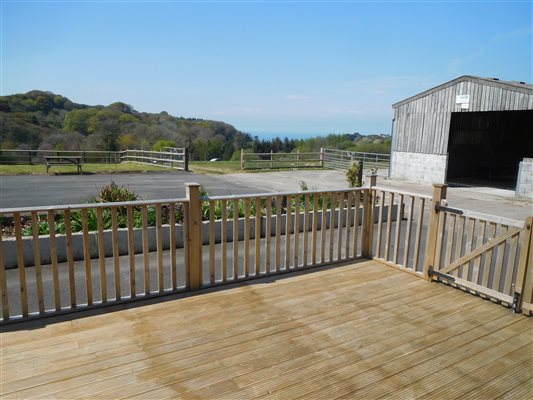 Large decked area overlooking the farm