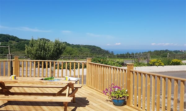 Outdoor dining with views to the sea