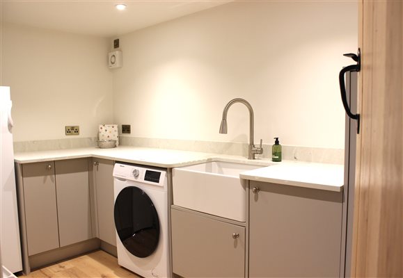Hop Kiln Utility Room with washer dryer and extra fridge
